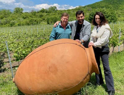Up close and personal with Qvevri wine at a winery in Georgia.