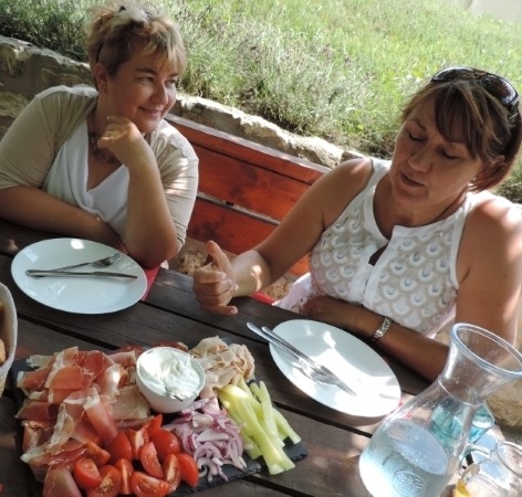 Enjoying the pleasures of a cold cuts lunch while touring wineries in Etyek.